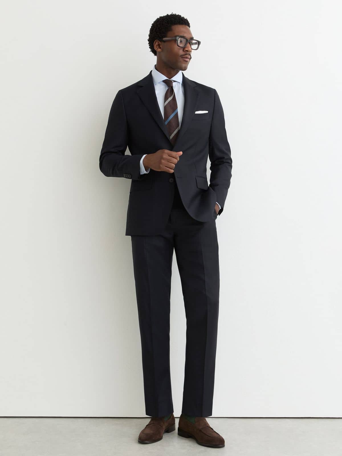 Classic black single-breasted custom suit by best tailor in Koh Samui